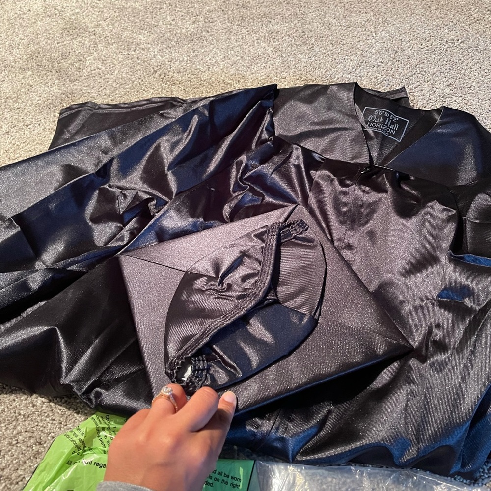 Black graduation cap and gown